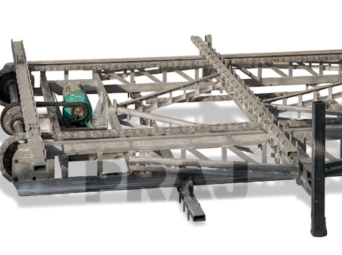 Automated rake ice delivery system on overhead track — Praj Refrigeration